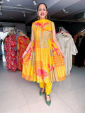 YELLOW PRINTED AND EMBROIDERED MUSLIN ANARKALI SUIT